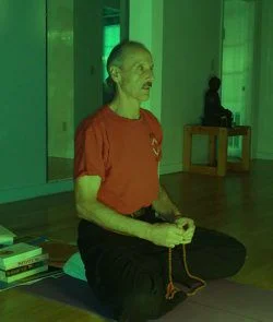 A picture of Swami Doing Mantra.