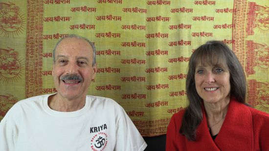 a picture of Lisa and Kenny doing the radio talk show The Key to Understanding Spiritual Yoga