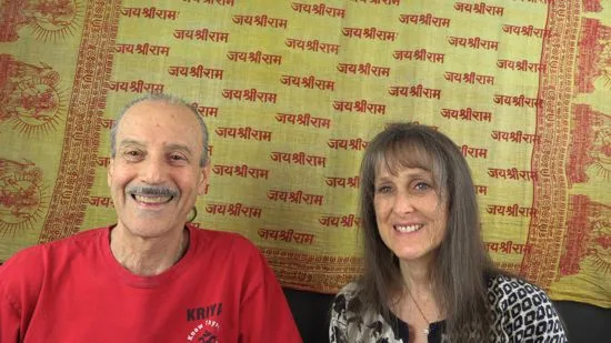A picture of Lisa and Kenny doing the radio talk show titled Breaking the Code with Truth