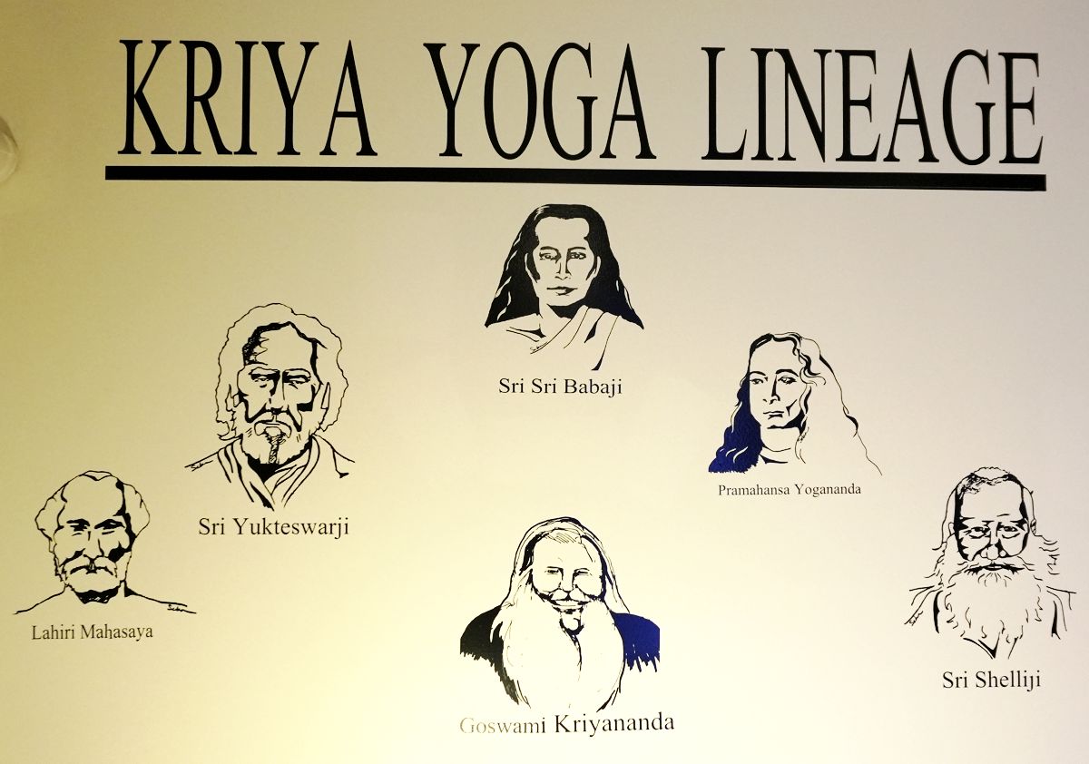 A picture of the classroom wall in Hampton NH, of the Kriya Yoga Lineage.