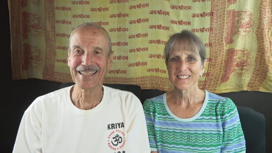 A picture of Lisa and Kenny doing the podcast titled Transcending the Belief in Opposites.