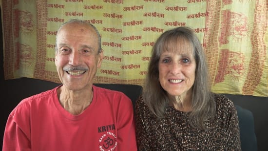 A picture of Lisa and Kenny doing the podcast titled Validate Happily Ever After.