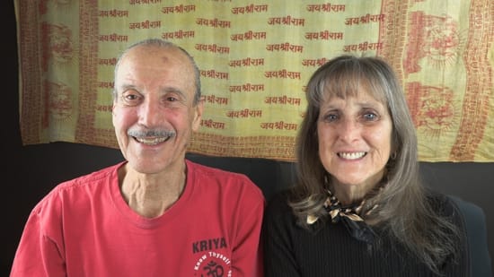 A picture of Lisa and Kenny doing the podcast titled Imitation of Life Without Deity.