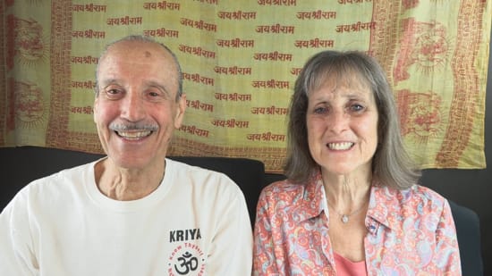 A picture of Lisa and Kenny doing the podcast title Mistaking Sentimentality for Spirituality.