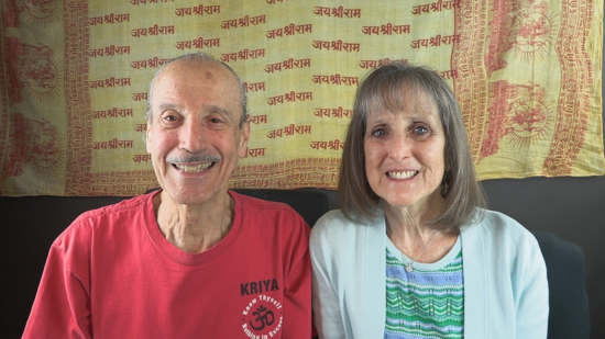 A picture of Lisa and Kenny doing the podcast title God is Beyond Google.