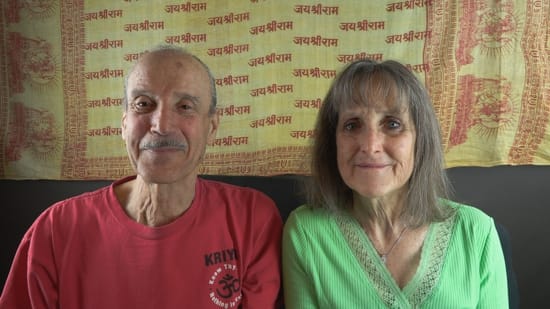 A picture of Lisa and Kenny doing the podcast titled The Rhythm of a Spiritual Practice.