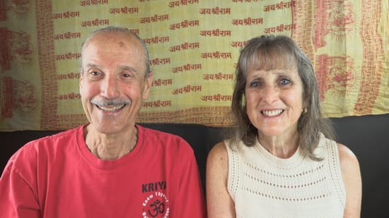 A picture of Lisa and Kenny doing  the podcast titled Rising into Sabbath Consciousness.