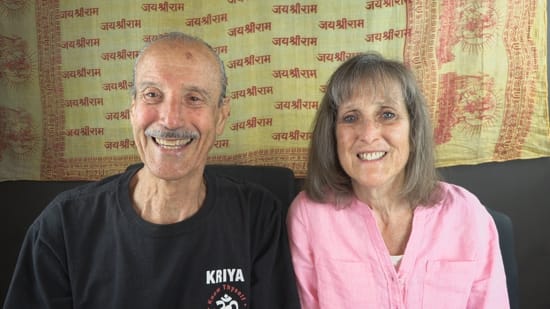 A picture of Lisa and Kenny doing the podcast titled A Body Rendered Pure by Mind.