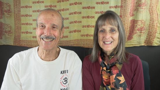 A picture of Lisa and Kenny recording the podcast titled: The Likelihood of Conscious Ascension.